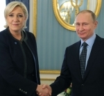1290234-marine-le-pen-et-vladimir-poutine-en-russie-le-24-mars-2017.jpg