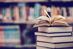 3154_263_book-in-library-with-open-textbook.jpg