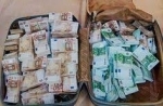 VALISE MAGIQUE EN DOLLARS